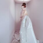 Hari Nef Instagram - my second #metgala—and nothing compares. @voguemagazine, anna wintour, and andrew bolton: thank you as ever for including me i wore custom @hm with a corset underneath by the legendary @misterpearlofficial the met's dress code this year, 'the garden of time,' samples its name from a short story by j.g. ballard. it's a fanciful little allegory which, the way i saw it, unmines the tension between the future and the past this lead me to think about high glamour: how it looks, why it looks like that, where it comes from. i took my 'avedon fashion' book off the shelf, opened it up. i locked onto margot mckendry in the background of a photo from 1961 (slide 3). she reminded me of crystal labeija (slide 5) in frank simon's 1968 documentary 'the queen,' which goes behind the scenes of a manhattan drag pageant (in 1968, dressing in drag was effectively illegal). so i thought about how the visual ideal of glamour travels, from high society to its fringes—and all the way through the decades. what does it mean for me, a card-carrying member of "the new world" (and you know exactly what i mean) to evoke the glamour of the old world? and what did it mean for my sisters who came before me? their beauty and grandeur moves me; i reflect on what they risked for it. i wanted to honor them last night thank you @chrishoran20 for your vision and hustle and for keeping me on best dressed lists—and occasionally worst-dressed lists, which is always cooler! no one does it like you thank you to @hairbyorlandopita and @yadim for sanctifying me from the neck up. i can't believe i get to be coiffed and beat by such absolute mavericks. yadim used @valentino.beauty...i hear there are some exciting things going on over at maison valentino in the near future ;) thank you to @aarondnewbill and @meansss at @imgmodels for keeping me in fashion. i love you and congratulations to @condeunited who won the day :)