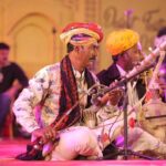 Harshdeep Kaur Instagram - The Desert Festival in the Golden City was a sight to behold, with enchanting cultural performances by renowned singer Harshdeep Kaur, Rajasthani folk artist Tagaram Bheel, and mesmerizing Kalbelia dance by Gulabo Devi. It was truly a dazzling showcase of talent. #TyoharonKaDes #ColoursOfIndia #DesertFestival #Jaisalmer #Harshdeepkaur #ExploreRajasthan #Travelrajasthan #RajasthanTourism #Rajasthan