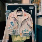 Hayley Kiyoko Instagram - “Color is my main driving force,” explains @hayleykiyoko of her Panorama tour wardrobe. Coordinating her looks with the set design, her closet consists of a yellow and pink coordinating Collina Strada set, a glittering heart-shaped Area crop top, and a grey, almost reflective Diesel bomber jacket. At her Boston stop, we went backstage with the pop star, author, and actor for the on-tour edition of our classic closet tour series. See the full story at the link in bio or at coveteur.com. Words by @camille_freestone Photos by @yk #hayleykiyoko #closettour #coveteur
