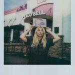 Hayley Kiyoko Instagram - a dream collab with @tacobell x @wearewildfang wearing their limited edition coverall! join Taco Bell Rewards to get early access today at 2pm PT 💜 #ad #tacobellpartner