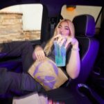 Hayley Kiyoko Instagram - a dream collab with @tacobell x @wearewildfang wearing their limited edition coverall! join Taco Bell Rewards to get early access today at 2pm PT 💜 #ad #tacobellpartner