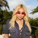 Hayley Kiyoko Instagram - a dream collab with @tacobell x @wearewildfang wearing their limited edition coverall! join Taco Bell Rewards to get early access today at 2pm PT 💜 #ad #tacobellpartner
