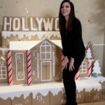 Heather Dubrow Instagram – A Hollywood holiday at the Dubrow’s !!! You know I live for a theme and LOVE a good detail…  This year’s theme is inspired by the legendary producers who have previously owned this house so it was really fun to add in things like: 8MM Film around the tree instead of ribbon, a golden holiday chocolate Oscar (I mean… 🤤), a “Dubrow Cinema’’ concessions cart with fresh popcorn, and vintage TVs playing holiday movies & shows that we all know and love ❤️ So FUN and special but I have to know… what’re your thoughts on this year’s theme and which detail is your favorite??! ALSO a much more in-depth tour of Dubrow 90210 is LIVE on my YouTube channel- click the link in my bio if you want more !! 💃🏻🎬🥂