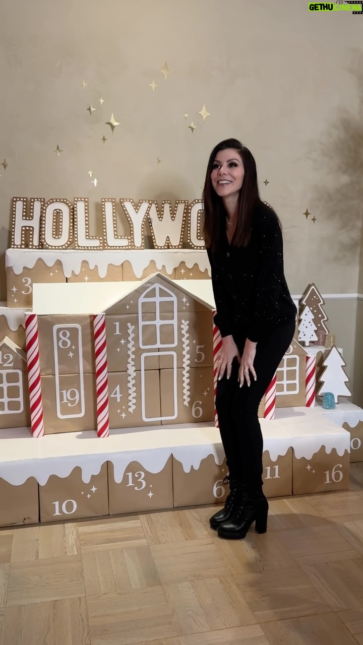 Heather Dubrow Instagram - A Hollywood holiday at the Dubrow’s !!! You know I live for a theme and LOVE a good detail… This year’s theme is inspired by the legendary producers who have previously owned this house so it was really fun to add in things like: 8MM Film around the tree instead of ribbon, a golden holiday chocolate Oscar (I mean… 🤤), a “Dubrow Cinema’’ concessions cart with fresh popcorn, and vintage TVs playing holiday movies & shows that we all know and love ❤️ So FUN and special but I have to know… what’re your thoughts on this year’s theme and which detail is your favorite??! ALSO a much more in-depth tour of Dubrow 90210 is LIVE on my YouTube channel- click the link in my bio if you want more !! 💃🏻🎬🥂