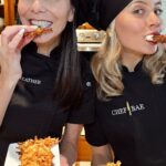 Heather Dubrow Instagram – Kicking off Hanukkah with a LATKE-OFF & the BEST holiday surprise ever! Which latke are you rooting for? Are you Team Heather (OG Latkes) or Team Chef Bae (Healthy Veggie Latkes)??! Tell us which latke style is the most YOU in the comments below 👇🏻 
Chef Bae’s Butternut, Zucchini, Carrot, Sweet Potato Latkes
1 small or 1/2 of a large butternut squash, shredded
2 zucchinis, shredded
2 purple carrots, shredded
1 large sweet potato, shredded
2 eggs
1/2-3/4 cup paleo flour
Sea salt & black pepper, to taste
Olive oil, for frying
Unsweetened dairy-free yogurt or sour cream, for serving
Instructions:
Using a towel, squeeze the moisture out of the zucchini. In a medium bowl, combine all of the ingredients and form into 3-4” patties. Fry until golden and crispy. Serve the dairy-free sour cream.
Chef Heather’s Crispy Bird’s Nest Latkes:
1 1/2 pounds russet potatoes (3 to 4 potatoes), shredded
1 medium yellow onion, shredded
3 eggs
1 tbsp fresh lemon juice
2 tablespoons flour, of choice
1 teaspoon kosher salt
1/8 teaspoon freshly-ground black pepper
1 cup avocado oil, for frying
Applesauce, for serving
Instructions:
Using a salad spinner followed by a kitchen towel (Chef Heather’s secret method!) squeeze the moisture from the potatoes and onions. Combine the remaining ingredients and form into 3” nests. Fry until golden & crispy! Serve with apple sauce.