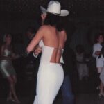 Heidi D'Amelio Instagram - BEEN THAT COWGIRL 🤠 throwing it back to almost exactly 24 years ago rockin’ this same cowboy hat on my wedding day!