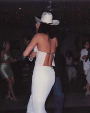 Heidi D'Amelio Instagram - BEEN THAT COWGIRL 🤠 throwing it back to almost exactly 24 years ago rockin’ this same cowboy hat on my wedding day!