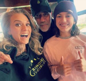 Hilarie Burton Instagram - Everything in my house is pink and green. 🌸🌲
It’s my favorite color combo. 
So naturally, when people started messaging me and asking for #grimoiregirl merch for the holidays, I had to make sure these items fit into our home! 
Thanks to my boys- Gus and @jeffreydeanmorgan - for helping mama with an impromptu photo shoot. Gus called dibs on my long sleeve shirt and Jeffrey has made off with my hat!! But the family that conjures together, stays together. Now off to pickup George who will surely be trying to steal my hoodie. 💖

Who are YOU gifting with magic this holiday season??
Copies of Grimoire Girl can be found in the link in my bio and these super cozy merch items are at :
https://www.grimoiregirlshop.com/
Link for that is also in my bio. 
🌳💕🐍🍡🎟️🪀🩰🧃🍬🌸🌵🦩🪴👛🦖💒🫛

The last slide is our best attempt at modeling. Gus calls it “rusty steel”.