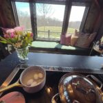Hilarie Burton Instagram - Prep days in the kitchen are infinitely better because @marlawalkerinteriors created the Witch Kitchen of my dreams. Tiny details make me love Spring. Pink pots. Fallen flower petals. Budding trees. Midday light on the cushions. And wallpaper. Can’t live without @timorous_beasties wallpaper. #eastereggs