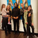Hilarie Burton Instagram – Anniversary date gives me an excuse to highlight Day 5 of artists making the world a more magical place! 
Years ago, @jeffreydeanmorgan and I wandered into @chasecontemporary gallery here in NYC. We’ve always been art gallery dwellers. That was one of our first dates in Santa Fe…hopping from gallery to gallery across the square. We have hit up galleries in London and Barcelona and Rhinebeck and little tiny small towns across America. Like moths to a flame.

Chase Contemporary Gallery always had pieces in the window that stopped us in our tracks. 
What I love about this gallery is how inclusive they have been to our children. Every time we go in there, the owners make a point of introducing our kids to the artists and asking them real questions about their interests and what they like about the exhibits. I’m so grateful that they are nurturing an appreciation for art in my kids.
Last year for our anniversary Jeffrey surprise me with this @connorbrothersofficial piece that I’m obsessed with. This year, to celebrate my book, he came home with these two fabulous book covers from the same artists. As luck should have it, the gallery was hosting a party for its current artist in residence… @lilblackgoat . Logan Sylve is such a talent, and we loved discussing his background of growing up in Louisiana and learning about his current adventures in Paris. I love his use of color and some of the mischievous toothy grins in his paintings. George became obsessed with this giraffe painting! 
Places like this nurture young artists and so we love visiting every chance we get. I hope that you guys give them a follow and then find galleries in your own town to support.
Thank you guys for a magical date night. The Morgans had a blast.