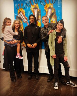 Hilarie Burton Instagram - Anniversary date gives me an excuse to highlight Day 5 of artists making the world a more magical place! 
Years ago, @jeffreydeanmorgan and I wandered into @chasecontemporary gallery here in NYC. We’ve always been art gallery dwellers. That was one of our first dates in Santa Fe…hopping from gallery to gallery across the square. We have hit up galleries in London and Barcelona and Rhinebeck and little tiny small towns across America. Like moths to a flame.

Chase Contemporary Gallery always had pieces in the window that stopped us in our tracks. 
What I love about this gallery is how inclusive they have been to our children. Every time we go in there, the owners make a point of introducing our kids to the artists and asking them real questions about their interests and what they like about the exhibits. I’m so grateful that they are nurturing an appreciation for art in my kids.
Last year for our anniversary Jeffrey surprise me with this @connorbrothersofficial piece that I’m obsessed with. This year, to celebrate my book, he came home with these two fabulous book covers from the same artists. As luck should have it, the gallery was hosting a party for its current artist in residence… @lilblackgoat . Logan Sylve is such a talent, and we loved discussing his background of growing up in Louisiana and learning about his current adventures in Paris. I love his use of color and some of the mischievous toothy grins in his paintings. George became obsessed with this giraffe painting! 
Places like this nurture young artists and so we love visiting every chance we get. I hope that you guys give them a follow and then find galleries in your own town to support.
Thank you guys for a magical date night. The Morgans had a blast.