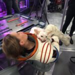 Hilary Swank Instagram - Whether it’s working, hanging out, playing or resting, this is my ♥️ dog, @mamamoon I’m so grateful to have found her on a 200 mile desolate highway in 28°, pregnant and to be able to help her. She is paying me back in spades and then some. You may remember I told you I was claustrophobic in my spacesuit and had to work really hard through it, she was a huge component of that. She just knew, she would struggle to get out of the person’s arms holding her once a take was complete and curl onto my chest and just simply be and breath with me. #WhoRescuedWho? Thanks @deityanimalrescue for helping us find all her sweet babies homes. We 💜 you angel ladies! #AdoptDontShop #MyUnspokenPet #DogsOfInstagram 🐶 🐾 💫💝