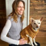 Hilary Swank Instagram - Hi everyone! 😊 I’ve been busy filming and of course…knitting! I teamed up with @debbieblissknits and @lovecraftscom to make something special that would not only be fun and cozy, but would also go to a good cause!! 100% of the proceeds, from the price of the pattern goes to the @hilaroofoundation A nonprofit I lovingly started that brings kids who have been given up on and animals who have been abandoned, together to help heal each other. And since it’s spring, that means there’s still a chill in the air, so we made a sweater vest…wait for it….for you AND your dog!! Here’s @mamamoon (modeling perfectly all angles 😂) and me in our matching vests. 🥰 🐶 Link to the pattern above in my bio!! #Knitter #Hilaroo #ChangeThePathOfASoul #WhoRescuedWho #Spring