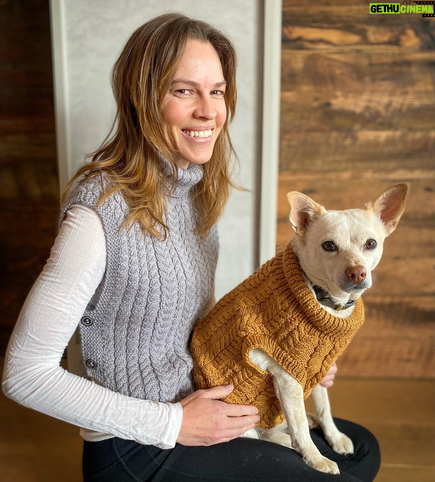 Hilary Swank Instagram - Hi everyone! š Iāve been busy filming and of courseā¦knitting! I teamed up with @debbieblissknits and @lovecraftscom to make something special that would not only be fun and cozy, but would also go to a good cause!! 100% of the proceeds, from the price of the pattern goes to the @hilaroofoundation A nonprofit I lovingly started that brings kids who have been given up on and animals who have been abandoned, together to help heal each other. And since itās spring, that means thereās still a chill in the air, so we made a sweater vestā¦wait for itā¦.for you AND your dog!! Hereās @mamamoon (modeling perfectly all angles š) and me in our matching vests. š„° š¶ Link to the pattern above in my bio!! #Knitter #Hilaroo #ChangeThePathOfASoul #WhoRescuedWho #Spring