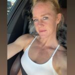 Holly Holm Instagram - Cruisin with my girl, River… aka my neck pillow.
