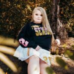 Honey Boo Boo Instagram - It's honestly so crazy to believe that I'm a senior this year. I've had so many disadvantages along the way but I've never let that stop me. I have so many people to thank for pushing me & making sure my head was on straight. There were plenty of times I felt like just giving you, I felt I couldn't do it anymore but something told me not to give up & I didn't. In a little over 6 months, I will walk across the stage to receive my diploma & I hope I made everyone proud of me, especially my nana that was looking down on me the whole way through & even if I didn't I will always be so proud of myself. Also everyone can say hey to your future neonatal nurse 🥰 #classof2023 #seniorszn #imout Thank you @kellyleverettphotography for these beautiful pictures 💗! 💄- @slayedbymiraa._ 👁 - @lashedby_dannii 💇🏼‍♀️ - @tiasiaslays_ & @stizzygii