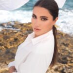 Huda ElEtrreby Instagram - @carolinaherrera 🤍 Photographer @mseifphotography Stylist @nourbozz Stylist assistant @waelfrng Makeup @kiwarkis Hair @toni.saade Earrings @auroreezzedine