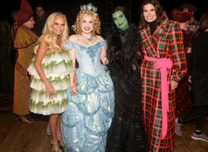 Idina Menzel Instagram - Still reeling from #Wicked20. What an incredible celebration and reunion with so many friends. I’m so proud to be a part of this family. 💚

Photos by Bruce Glikas @bruglikas @broadwaybruce_

Styling: @taraswennen 
Hair: @anthonycampbellhair 
Makeup: @genevieveherr 
Coat: @azziandosta 
Top/Trousers: @albertaferretti 
Shows: @sam_edelman 
Clutch: @jimmychoo 
Ring: @kavantsharart