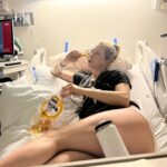 Iliza Shlesinger Instagram - Postpartum done right. I didn’t stop eating from the moment I had him until we left the hospital. ➡️ swipe to the end to see the @haveacornchips I accidentally dropped into his bassinet as I stood over him power eating and staring at my sweet little boy. It got wedged between the plastic and the mattress 🤷‍♀️ Hope he likes salty corn milk! 🧂 🌽 🥛 💦 the @yeti I just realized was there but YETI deserves a shoutout because the good ice they gave me at the hospital stayed AS ICE even after I got home. Best part is I’ve had it for years and it doesn’t give me lead poisoning. Bring it to your next delivery!