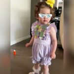 Iliza Shlesinger Instagram - We are Jewish but Sierra’s LA Grandma isn’t which means she gets Easter (and an Easter basket! I’m so jealous 🤍) and we all get Christmas. We filled eggs with Easter “candy” like… raisins and cashews and dried peaches and she had the best time. We did the neighborhood egg hunt too but she didn’t eat the chocolate because Mommy, who never lies, told her it was too spicy. Highlight for me was her holding this little blue bunny so delicately like it was a baby. Nothing will beat last year’s Easter outfit (last slide) but this one came close. 🐣🐰