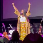 India.Arie Instagram – Take a Moment to read my 💜

I take JOY in remembering our Ancestors. 

We exist and the way we do BECAUSE of them. 

Yes we are our OWN SELVES

And ALSO YES We are a part of an interconnected multti generational whole ~ and Its not all easy. 

NOTHING IS ALL EASY. 

But keeping the music of our musical ancestors alive is ALL JOY! 

The Ancient Egyptians believed we all die twice. First, when we take our last breath. Second, when our name is spoken for the last time.

At our ( 2nd ) Annual Atlanta SongVersation shows we we will honor our Ancestors every time! 

Last year @kevinrossmusic and samg BABY COME TO ME BY James Ingram (rip)   Patti Austin (who thank God is still alive and kicking and SO FUN! 

THIS YEAR WE HONORED ONE OF THE GREATEST @luthervandross 

I got to meet him ONCE and he was SO COOL, and VERY KIND to me. 

He spoke a word over my life ~ that, had THANKFULLY proved to be true. 

THANK YOU LUTHER for showing us what it means to let our TONE sing the song.  And I cant WAIITTT TO SEE THE NEW DOCUMENTARY! 

p.s. there was a little (BIG) surprise (actually 2) at the end of this moment ~ you had to be there lol maybe next year you will! 

#luthervandross #soamazing #loveletterindiaarie #worthy #songversation