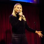 Irina Voronina Instagram - Photo dump from my Sunday show! Awesome pics by @pontak04 and @sunshineheadshots . Thank you @acmeadam for putting on a great show @hollywoodimprov ! 🎤🎤😃😃 #irinavoronina #womenincomedy #standupcomedy #lacomedyscene #hollywoodimprov #eristalentagency