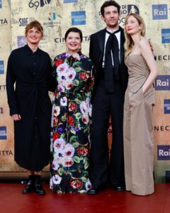 Isabella Rossellini Instagram - Last night at the @premidavid with my favorite sisters in the world Alice and Alba Rorhwacher and Josh O’Connors celebrating our 13 nominations for the film LA CHIMERA. I felt most proud to see the great Gianluca Farinelli director of @cinetecabologna wearing the rose made with the wool of one of my sheep, a rare ancient breed of Lincoln Long Wool @livestockconservancy . I know I am going to write something strange but in my head I see a parallel between artisans who make art films , film preservation and preservation of ancient breed of farm animals . It is all our patrimony . @mamafarm @cinetecabologna #alicerorhwacher #albarorhwacher #joshoconnor photos @rocco_giurato @dolcegabbana