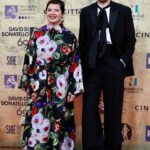 Isabella Rossellini Instagram - Last night at the @premidavid with my favorite sisters in the world Alice and Alba Rorhwacher and Josh O’Connors celebrating our 13 nominations for the film LA CHIMERA. I felt most proud to see the great Gianluca Farinelli director of @cinetecabologna wearing the rose made with the wool of one of my sheep, a rare ancient breed of Lincoln Long Wool @livestockconservancy . I know I am going to write something strange but in my head I see a parallel between artisans who make art films , film preservation and preservation of ancient breed of farm animals . It is all our patrimony . @mamafarm @cinetecabologna #alicerorhwacher #albarorhwacher #joshoconnor photos @rocco_giurato @dolcegabbana