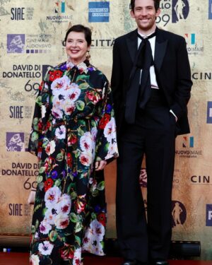 Isabella Rossellini Instagram - Last night at the @premidavid with my favorite sisters in the world Alice and Alba Rorhwacher and Josh O’Connors celebrating our 13 nominations for the film LA CHIMERA. I felt most proud to see the great Gianluca Farinelli director of @cinetecabologna wearing the rose made with the wool of one of my sheep,  a rare ancient breed of Lincoln Long Wool @livestockconservancy .
I know I am going to write something strange but in my head I see a parallel between artisans who make art films ,  film preservation and preservation of ancient breed of farm animals . It is all  our patrimony .
@mamafarm @cinetecabologna #alicerorhwacher #albarorhwacher #joshoconnor photos @rocco_giurato @dolcegabbana