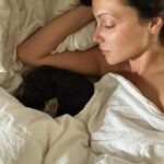 Italia Ricci Instagram - Snugs with the little radiator before she buries herself all the way down at my feet under the tucked in sheets and duvet so I can wake up 18x a night to make sure she’s still breathing.