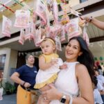 Iza Calzado Instagram – It’s been an amazing first year with our little girl. Ben and I couldn’t be happier or more grateful for the biggest blessing God decided to grant us. As we look back on Deia’s first year, we can’t help but feel so lucky to be able to experience becoming parents who get to watch their baby learn and grow each day. We knew we had to give back, if only to be able to share at least an ounce of the love we feel in our hearts.

So on this day, we gave back to the girls of Buklod Kalinga at Mano Amiga Academy— singing songs, sharing dances, and eating to our hearts content. A happy day like this was made possible through the combined efforts of Paby’s Creative Events, Cocoon Studios, edamama, Aveeno, Sunnies, Belo Baby, Ecoboom, Crepe Glazik, and McDonalds, Ninang Lynn and Teacher Dayleen of Mano Amiga Academy, Izadoration, Mimi, and Aya, all of whom put such big smiles on the girls faces, and @divinemlee with @raisinglittleph for Deia’s dress. 👗☀️

Thank you for joining us in celebrating Deia’s first year. There will be more to come and more things to be grateful for, but for now, we thank the Lord that we can share this big love beyond our little family.

Deia’s Dress: @raisinglittleph
Planning: @pabyscreatesevents
Backdrop: @flourishandfrills
Activity: @craftcornermanila 
Photographer: @cocoonstudioph
Food: @crepeglazik @mcdoph
Cakes and cupcakes: @cupcakelabph