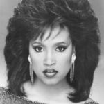 Jackée Harry Instagram - Before #BlackHistoryMonth is over, here’s a bit of #BlackHerstory: It's 1988. Dangle earrings & massive wigs have me in a chokehold. I’d recently become the 1st black woman to win an Emmy for Best Supporting Actress in a Comedy so I took my sister, Brenda, to Paris to celebrate. We were walking in front of the Arc de Triomphe on a gorgeous day and Brenda was being an unbelievable drag. She was begging me to go to Versailles and I couldn’t think of anything that sounded more BORING. “Go by yourself,” I said. “I don’t need to be bothered with you.” 💅🏾 Well, THAT set her off! She shouted: “You think ‘cause you’re a big Hollywood star you don’t need to act like a decent person or show a goddamn ounce of consideration for somebody else!” Then she reached out, tore my wig off, and ran away with it. I cursed her up and down, child. I shouted after her, but it was too late. I was standing there, alone, no wig, my hair all a mess, right in front of the Arc de Fucking Triomphe. Mortified. At my hotel, I changed my flight home so I wouldn’t have to fly with her, then I didn’t speak to her for an entire year. But her words stuck with me. I started watching myself, noticing how I was acting, and I realized she was right. 😕 I was a black girl in Hollywood, navigating a unique position alone. Cosby had won an Emmy. Robert Guillaume won. Isabel Sanford and Gail Fisherhad too. There were only four people on Earth who knew what I felt like, and I didn’t have their phone numbers. I went off the rails… If I had a support system of black women who shared similar experiences or provided a sense of belonging, I might’ve navigated my situation differently. But I’m grateful I had another black woman, my sister, to hold me accountable for harmful behavior and a conceited attitude. Black women, we have a long history of collective action and community building. Whether it’s organizing against racial discrimination and economic disparities, or as simple as helping someone get their ego in check. We have to keep looking out for each other because our collective strength is what’s going to raise us up, individually and as a community. Now, go check on your sis. 💋