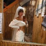 Jackie Cruz Instagram - Made it through our first year and hell yeah there were trial and tribulations, but we are doing this damn thing. Love you baby @i.man.fernando 💕 #anniversary Wedding dress by the fabulous talented designer and good friend of mine, @viktorluna