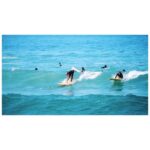 Jackie Cruz Instagram - Catching rays riding waves. ✨🏄🏽‍♀️