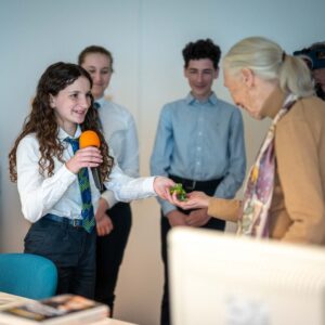 Jane Goodall Instagram - 🌟 Jane's global 90th birthday tour continues! Just last week in Prague, Dr. Goodall met with students, representatives, and teachers from five different schools, hosted by @ecp_prague.
 
🐸 Here, you see a student group sharing about their impactful frog restoration project. They also gifted Jane a charming paper frog model. She loved it so much, that it's currently keeping her stuffed monkey, Mr. H, company in Jane's hotel room!
 
Stay tuned for more stories from Jane on the road. (#DidYouKnow: She travels at least 300 days a year to spread her message of hope?) 🌍
 
📷 Mikhail Bobchinetskiy
.
.
.
#JaneGoodall #JaneGoodallInstitute #JGI #WildlifeConservation #Community #Prague #Education #Conservation #Frogs #FrogConservation