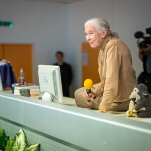 Jane Goodall Instagram - 🌟 Jane's global 90th birthday tour continues! Just last week in Prague, Dr. Goodall met with students, representatives, and teachers from five different schools, hosted by @ecp_prague.
 
🐸 Here, you see a student group sharing about their impactful frog restoration project. They also gifted Jane a charming paper frog model. She loved it so much, that it's currently keeping her stuffed monkey, Mr. H, company in Jane's hotel room!
 
Stay tuned for more stories from Jane on the road. (#DidYouKnow: She travels at least 300 days a year to spread her message of hope?) 🌍
 
📷 Mikhail Bobchinetskiy
.
.
.
#JaneGoodall #JaneGoodallInstitute #JGI #WildlifeConservation #Community #Prague #Education #Conservation #Frogs #FrogConservation