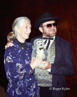 Jane Goodall Instagram - Have you met Mr. H? 🐒 This monkey plushy has been with Jane on many adventures — including when she was named a @unitednations Messenger of Peace (last slide)!

Mr. H was given to Jane by Gary Haun (slide 2), a man who lost his eyesight at 21 years old, who pursued his dreams of being a magician despite the challenges of working in a field known for visual techniques. As Jane often shares, Gary initially thought he was giving her a chimpanzee plushy, until she had him feel that Mr. H had a tail (chimpanzees and other great apes don’t have tails, but monkeys do). 

Jane was deeply inspired by Gary’s story, and so she decided to carry Mr. H as a symbol of the indomitable human spirit — one of her four main reasons for hope! 

📸 credits:
Video: JGI
Image 1: Roger Kyler
Image 2: Roy Borghouts
Image 3: Michael Collopy
Image 4: UN Dept of Public Information

Alt Text
Slide 1: Video of Dr. Jane Goodall in a sunlit room holding a monkey plushie and answering the question “What is the story behind the plush toy monkey you’re holding”
Slide 2: A photo of Jane with Gary Haun, who is wearing sunglasses and a magician’s hat, both holding Mr. H in between them. 
Slide 3: photo of Jane at a podium holding up Mr. H to the audience with one hand presenting his tail.
Slide 4: A photo of Jane with children who are petting Mr. H, because as Jane says, the inspiration rubs off. 
Slide 5: A photo of Jane and former UN Secretary-General Kofi Annan at her appointment ceremony as a United Nations Messenger of Peace in 2002 with Mr. H in between them. 

#MrH #Magician #JaneGoodall #JaneGoodallInstitute #JaneAt90 #Hope #HopeIntoAction #Education #StoryTime #Plushy #TravelCompanion #UN #MessengerOfPeace