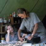 Jane Goodall Instagram - 🌿 Dr. Jane Goodall and Her Mother, Vanne 🌸 Behind every remarkable individual is a source of inspiration, and for Jane Goodall, that guiding light was her beloved mother, Vanne. With a heart full of compassion and a spirit of adventure, Vanne instilled in Jane the values of empathy, curiosity, and perseverance. When Jane arrived in Gombe in 1960 to conduct her groundbreaking observations into the world of chimpanzees, her mother was by her side. Jane often credits Vanne's unwavering support and encouragement for fueling her passion for understanding and protecting the natural world. This Mother's Day, let's celebrate a bond that continues to shape Jane's legacy of conservation and compassion 🌍💫 #JGI #janegoodall #Gombe #mothersday 📸: Hugo van Lawick Alt Text: A photo of a young feminine person with a pony tail (Dr. Jane Goodall) (right) working on a typewriter next to an older feminine person sitting at a table watching (Vanne Goodall) (left).