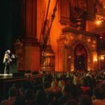 Jane Goodall Instagram - “If you’ve heard this story before, well that’s too bad,” Dr. Jane Goodall said with a twinkle in her eye to a packed auditorium at Seattle’s Moore Theater. Dr. Goodall went on to explain that in indigenous American tribes, stories are often told over and over again, becoming a source of comfort and familiar knowledge. She expressed her appreciation for this tradition and joked that if anyone in the audience didn’t like it, “too bad,” as she would be sharing her familiar stories tonight and throughout her tour — she’s currently traveling the world in celebration of her 90th birthday. As Jane tells us, stories create a sense of community and connection to each other. This humorous anecdote from Jane was a powerful reminder that stories have the ability to transcend time and culture, bringing people together and providing comfort and inspiration. Did you catch Jane live in Seattle, at the Beacon Theater in NYC, or at another tour event? Share your favorite stories in our comment section so we can connect within our own JGI community! 📷 Alyssa Rasp/MSGE, Jim Bennett, JGI/Sylvie Alt Text Slide 1: Jane speaking to the packed auditorium of the Beacon Theater in NYC. Slide 2: Jane jogging a few steps out onto the stage towards the podium where Mr. H, her stuffed monkey companion, is already placed. Slide 3: Photo of the marquee of the Moore Theater in Seattle with Jane Goodall presented. Underneath, there is a long line of audience members awaiting entrance to the theater that is wrapped around the building. Slide 4: A photo of a birthday edition Mr. H (holding a birthday cake instead of his usual yellow banana) in front of the stage at the Moore Theater. Slide 5: A photo of a packed house in the Moore Theater with Jane speaking onstage. @beacontheatre @stgpresents #JaneAt90 #JaneGoodall #JaneGoodallInstitute #ConservationHeroes #Birthday #90thBirthday #Conservation #CommunityConservation #Volunteer #Activism #TakeBoldAction #BoldAction #Hope #HopeIntoAction