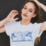 Jemima Kirke Instagram - A few months back an offer showed up in my inbox to design a shirt for an organization that raises awareness for menstrual inequity. Menstrual inequity? It took me a minute. Despite the interjection of my privilege I tried to fathom this small, albeit dark corner of reality. Not having the means to look after a normal bodily function would have mental, emotional and physical consequences. For people living in under resourced areas and/or antiquated societies, it seemed a cruel insult to injury. I’m grateful to @wearethecycle for allowing me to contribute to their cause. The design depicts an ambiguous domestic scene where two people, casually share a bed. Thats it. Anything else is projection. Nudity and beds don’t always reference sex. Discussions on anatomy are not always vulgar. But these things often illicit lazy interpretations and projections. Intimacy, care and connection can look like many things. Like educating a child about menstruation and the changes in their body. Or like two people resting together, simply because they’re on the same cycle. Available for 3 wks via @everpresshq, each t-shirt sale directly funds this life-changing program. #buyashirtbreakthecycle LINK IN BIO