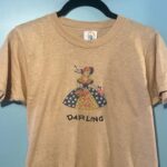 Jemima Kirke Instagram - Thank you for yesterday’s spree. Never thought I’d have a hobby beyond smoking cigarettes and cleaning. The “Baby-tees” are the third t-shirt series. All pictured are gone (save for slide #8) See story archives for the others and more to come today. PS!!! I see all your DMs. I won’t respond to DMs that come in after I’ve already posted that a shirt has SOLD. Make sure you get to the end of the stories or check the archives before messaging me.
