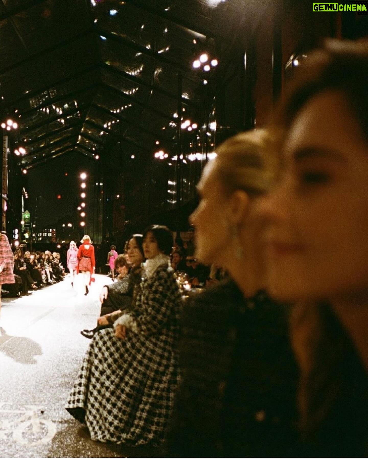 Jenna Coleman Instagram - When Chanel met Manchester… walking through the streets of my youth enroute. Rainwater at my feet. Celebrating the vibrancy, grit, rebellion and chaos that is this city. Joy in my heart, music in the veins. Thank you @chanelofficial @virginieviard ✨ #chanelmétiersdart23 show photo @millie_brady 📸 and her sexy camera ❤️ xx