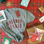 Jennifer Love Hewitt Instagram - We are bringing our Big Claus Energy to all of you! Holiday Junkie and @2021_co made tees to help you wear your Holiday Junkie spirit with pride! You can get them now @2021_co and we hope you love them as much as we do! Happy Holiday season🎅🏼❤️