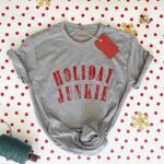 Jennifer Love Hewitt Instagram - We are bringing our Big Claus Energy to all of you! Holiday Junkie and @2021_co made tees to help you wear your Holiday Junkie spirit with pride! You can get them now @2021_co and we hope you love them as much as we do! Happy Holiday season🎅🏼❤️