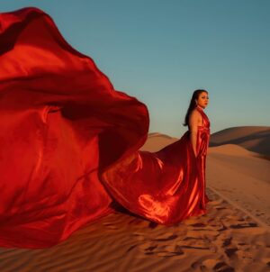 Jennifer Messina Instagram - When the sky lights up red to paint a sunset of gold 

So fun working with @jennifercmessina over the weekend and looking forward to many more creative adventures 🤍

A huge thank you to @las_vegas_dress for the gorgeous gowns! Go check her out 😎

#photographer
#californiaphotographer 
#arizonaphotographer 
#photographersofinstagram 
#glamis 
#glamisdunes 
#portraitphotography 
#lasvegasdress 
#influencer 
#artist 
#photographyart 
#flyerdress 
#desertvibes