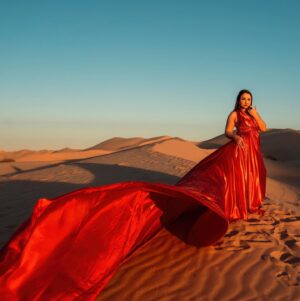 Jennifer Messina Instagram - When the sky lights up red to paint a sunset of gold 

So fun working with @jennifercmessina over the weekend and looking forward to many more creative adventures 🤍

A huge thank you to @las_vegas_dress for the gorgeous gowns! Go check her out 😎

#photographer
#californiaphotographer 
#arizonaphotographer 
#photographersofinstagram 
#glamis 
#glamisdunes 
#portraitphotography 
#lasvegasdress 
#influencer 
#artist 
#photographyart 
#flyerdress 
#desertvibes