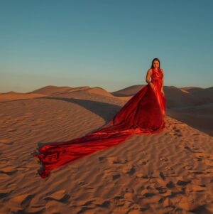 Jennifer Messina Instagram - When the sky lights up red to paint a sunset of gold 

So fun working with @jennifercmessina over the weekend and looking forward to many more creative adventures 🤍

A huge thank you to @las_vegas_dress for the gorgeous gowns! Go check her out 😎

#photographer
#californiaphotographer 
#arizonaphotographer 
#photographersofinstagram 
#glamis 
#glamisdunes 
#portraitphotography 
#lasvegasdress 
#influencer 
#artist 
#photographyart 
#flyerdress 
#desertvibes