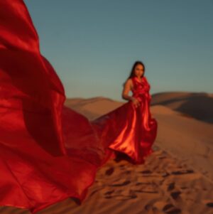 Jennifer Messina Instagram - When the sky lights up red to paint a sunset of gold 

So fun working with @jennifercmessina over the weekend and looking forward to many more creative adventures 🤍

A huge thank you to @las_vegas_dress for the gorgeous gowns! Go check her out 😎

#photographer
#californiaphotographer 
#arizonaphotographer 
#photographersofinstagram 
#glamis 
#glamisdunes 
#portraitphotography 
#lasvegasdress 
#influencer 
#artist 
#photographyart 
#flyerdress 
#desertvibes