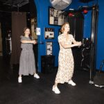 Jennifer Morrison Instagram - DAY 17: @dressember @unbreakableperformance with @juliamorrisonsummers #dressember #itsbiggerthanadress ⁠ ⁠ Photography @thetylershields⁠ Location @unbreakableperformance⁠ Editor & Stylist @eleanoramorrison⁠ Hair @leovalentinohair⁠ MUA @makeupbyapollo⁠ Dress @christydawn⁠ Sneakers @thealist.us @newbalance