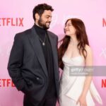Jenny Han Instagram – When my #xokitty co-showrunner @saschagrothchild and I called the cast to tell them we weren’t going to make it to the premiere because of the writers strike, Sang Heon said it felt like he was about to go to the prom, and he wasn’t going to get to hug his parents goodbye. 😭Cue waterworks from me! I worried over this decision for weeks– missing not just the premiere but all the press and the junket too. Sitting down for interview after interview for the first time is intimidating for anyone, but doing it in a language that is not your own is extremely difficult. I wanted to be by my Korean cast’s side and watch over them every step of the way. But looking at them all on the red carpet last night, watching their interviews, seeing them shine so bright– they didn’t need me at all. They did just fine without me. Better than fine. Amazing. And I couldn’t be prouder of them. I definitely cried. And I definitely teared up when I saw @ncentineo and @annacathcart on the red carpet. Noah, you’ll always have my heart for that. Thank you for showing up to support our girl on her big night. And now I am crying again! 😭 To the beautiful cast of XO, Kitty: I can’t wait for the world to fall in love with you. Okay, now I’m off to the picket lines fr!